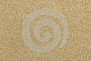 Texture of yellow sand. Homogeneous background photo