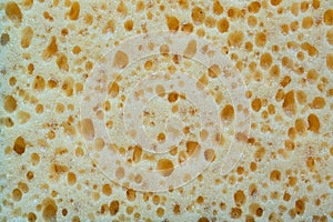 texture of yellow sponge, object background concept