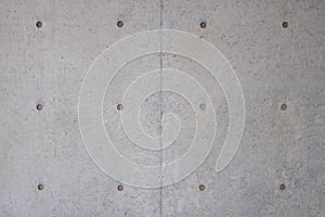 Textured and aligned exposed concrete.