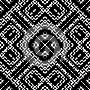 Textured black and white houndstooth seamless pattern. Vector ornamental background. Classic hounds tooth ornaments. Geometric