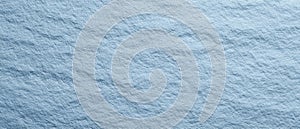 The textured blue fabric creating a soothing and calming background atmosphere. AI generated image