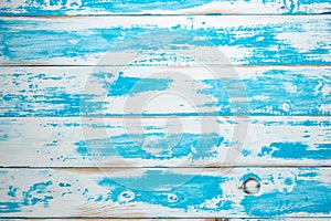 Textured blue summer wooden background. Top view