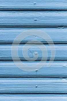 Textured blue wooden wall