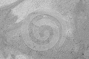 Textured concrete surface with swirling patterns