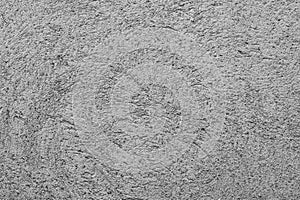 Textured concrete surface with swirling patterns