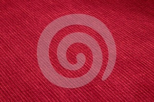 Textured corduroy furniture fabric in red colors