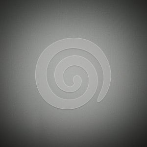 A textured gradient background featuring a smooth transition from dark to light gray,