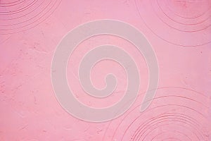 Textured light pink background with circles