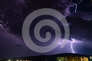 Textured night sky with bright lightning. Global warming