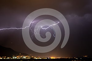 Textured night sky with bright lightning. Global warming