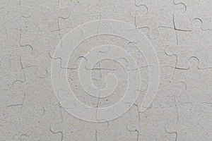 Textured paper surface of jigsaw puzzles. Background or backdrop for copy space