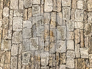 Textured pattern of an old stone brick wall