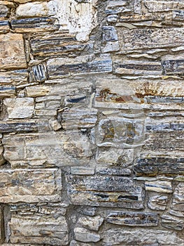 Textured pattern of an old stone brick wall