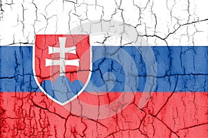 Textured photo of the flag of Slovakia with cracks