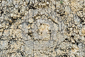 Textured stone background Rubble ballast in natural form in the rock wall