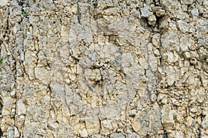 Textured stone background Rubble ballast in natural form in the rock wall