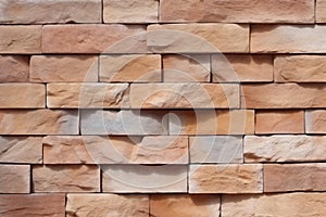 Textured stone wall brick background adorned with a seamless sandstone facade pattern.