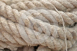 Coarse rope made from stems of natural hemp photo