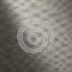 A textured surface featuring a gradient pattern ranging from light to dark. The texture
