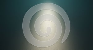 A textured surface illuminated by a soft spotlight creates a gradient effect. The light