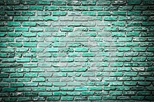 Textured wall of green bricks, detailed background