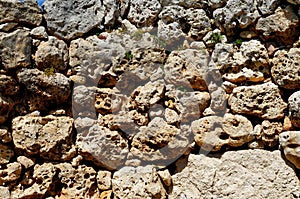 Textured wall of megalith temple of Ggantija, Gozo island, Malta