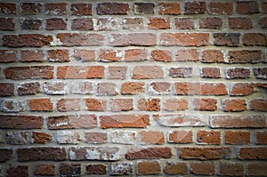 TExtured wall of red bricks, detailed background