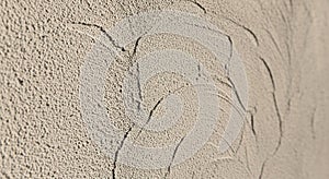 A textured wall surface with a