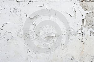 A textured white wall with extensive peeling and flaking paint.