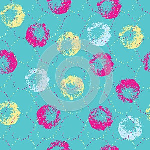 Textured yellow pink grey circles on acqua background seamless pattern.