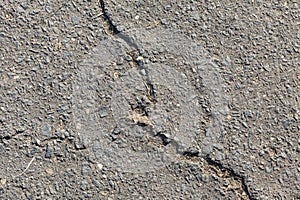 Grey clay, concrete wall with cracks