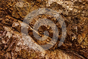 Textures and patterns of natural broken rocks and erosion of sea water over time, for background