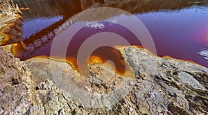 Textures of sulfuric deep red Water of Rio Tinto