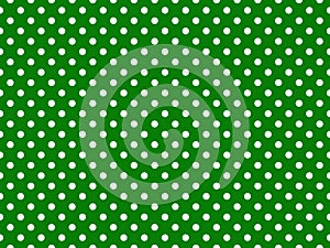 texturised white color polka dots over green background