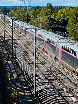 TGV high speed train train traveling on the railway track in Cavaillon in Provence in France