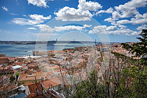 25th april bridge, Tagus river with ship and Lisbon