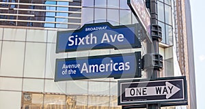 6th ave, Broadway Manhattan New York downtown. Blue color street signs photo