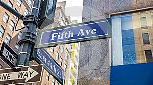 5th ave and E44 corner. Blue color street signs, Manhattan New York downtown