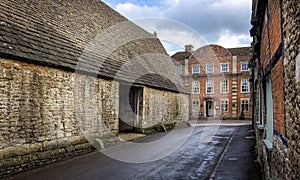 14th Centruy Tithe Barn and The Red Lion Inn in Lacock, Wiltshire, UK