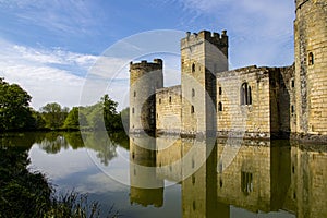 14th century Bodium castle surrounded by a moat in the County of Sussex in England.