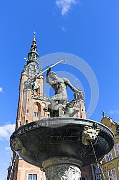 17th century Neptune`s Fountain Statue at Long Market Street , Gdansk, Poland