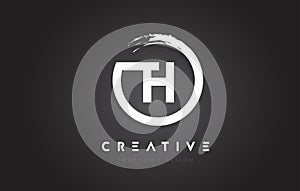 TH Circular Letter Logo with Circle Brush Design and Black Background. photo