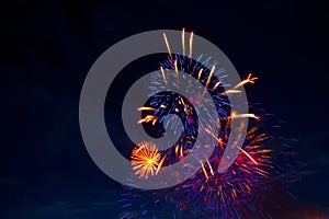 4th July fireworks. Fireworks display on dark sky background