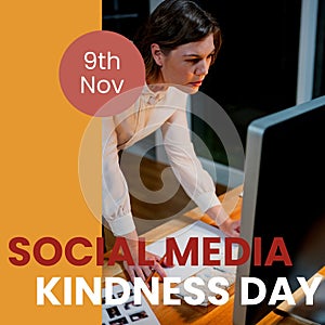 9th nov, social media kindness day text over caucasian businesswoman working over computer in office photo