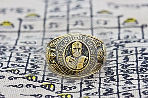 Thai amulet ring on background