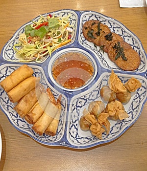Thai appetizer platter with thai chilli sauce