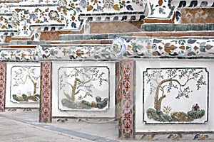 Thai art wall around Wat Arun Rajwararam.