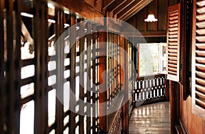 Thai Asian old vintage house wooden hallway corridor with natural light