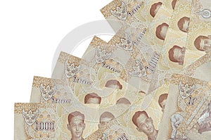 1000 Thai baht bills lies in different order isolated on white. Local banking or money making concept