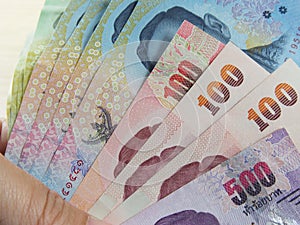 Thai baht money, earn and save money